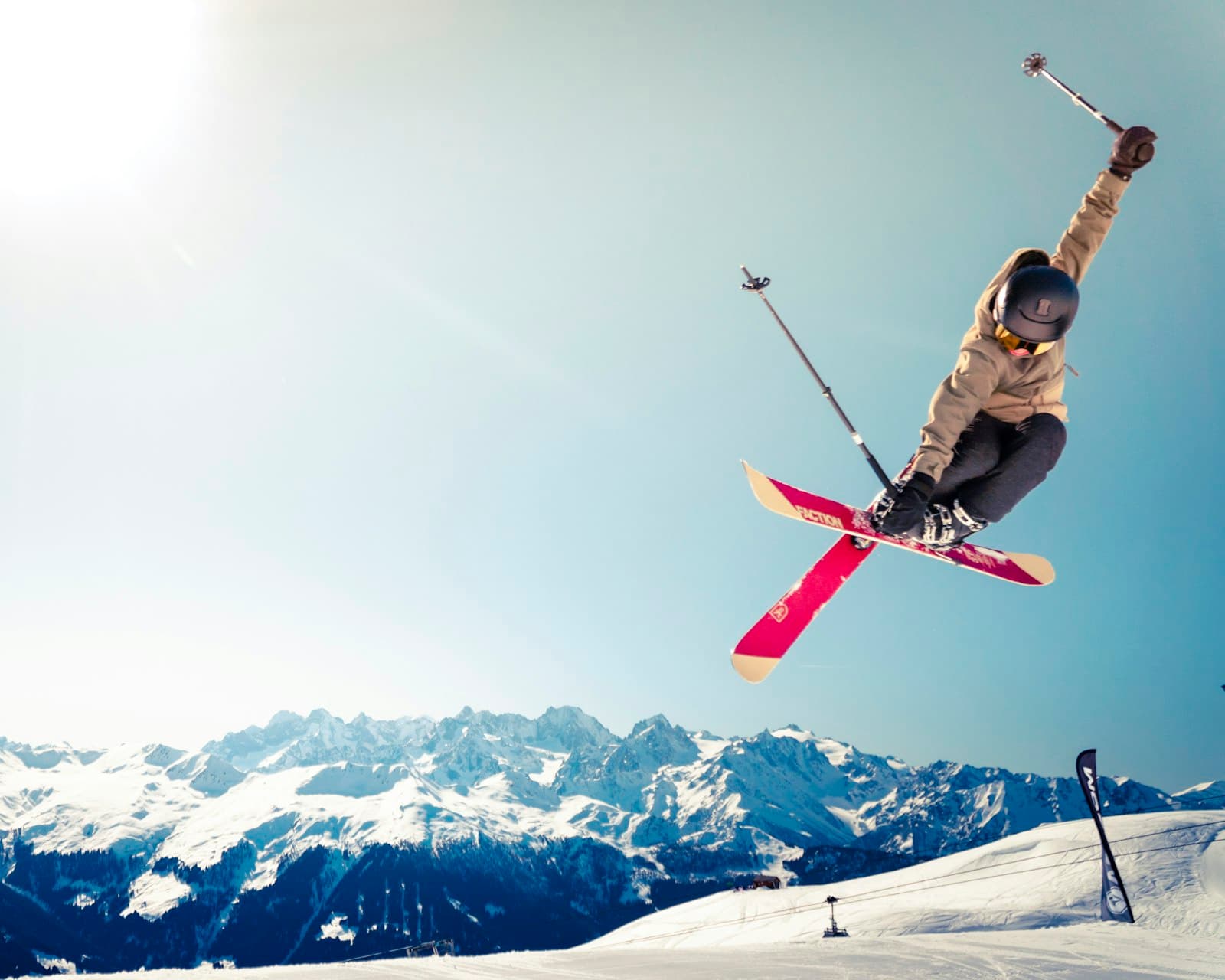 Ski instructor and student on snowy slope — English ski lessons